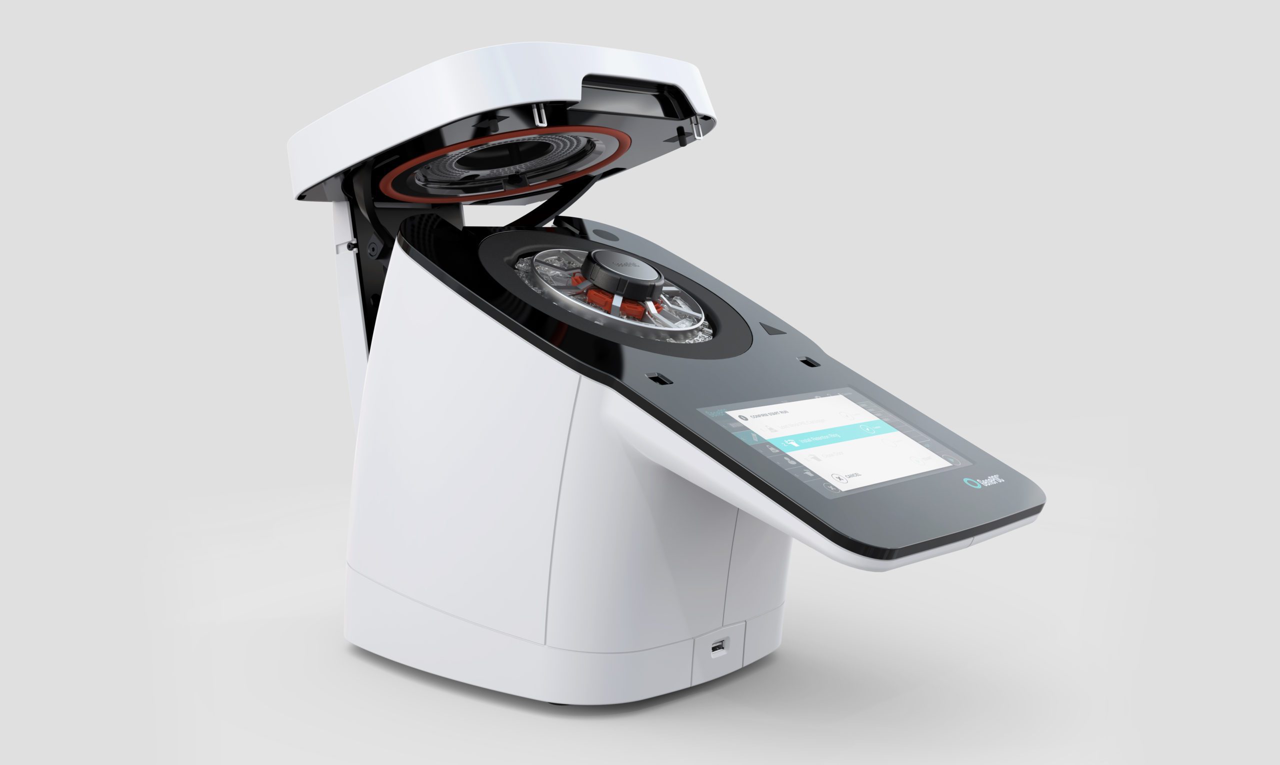A modern laboratory centrifuge with a partially open lid, designed by an Agence de design industriel à Montréal. The device is white with a black control panel and touchscreen display, set against a plain light gray background.